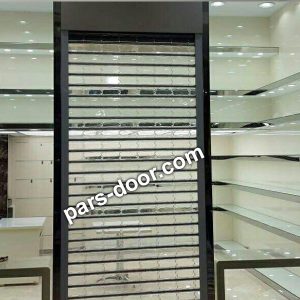 درب ورودی مغازه با کرکره شفاف